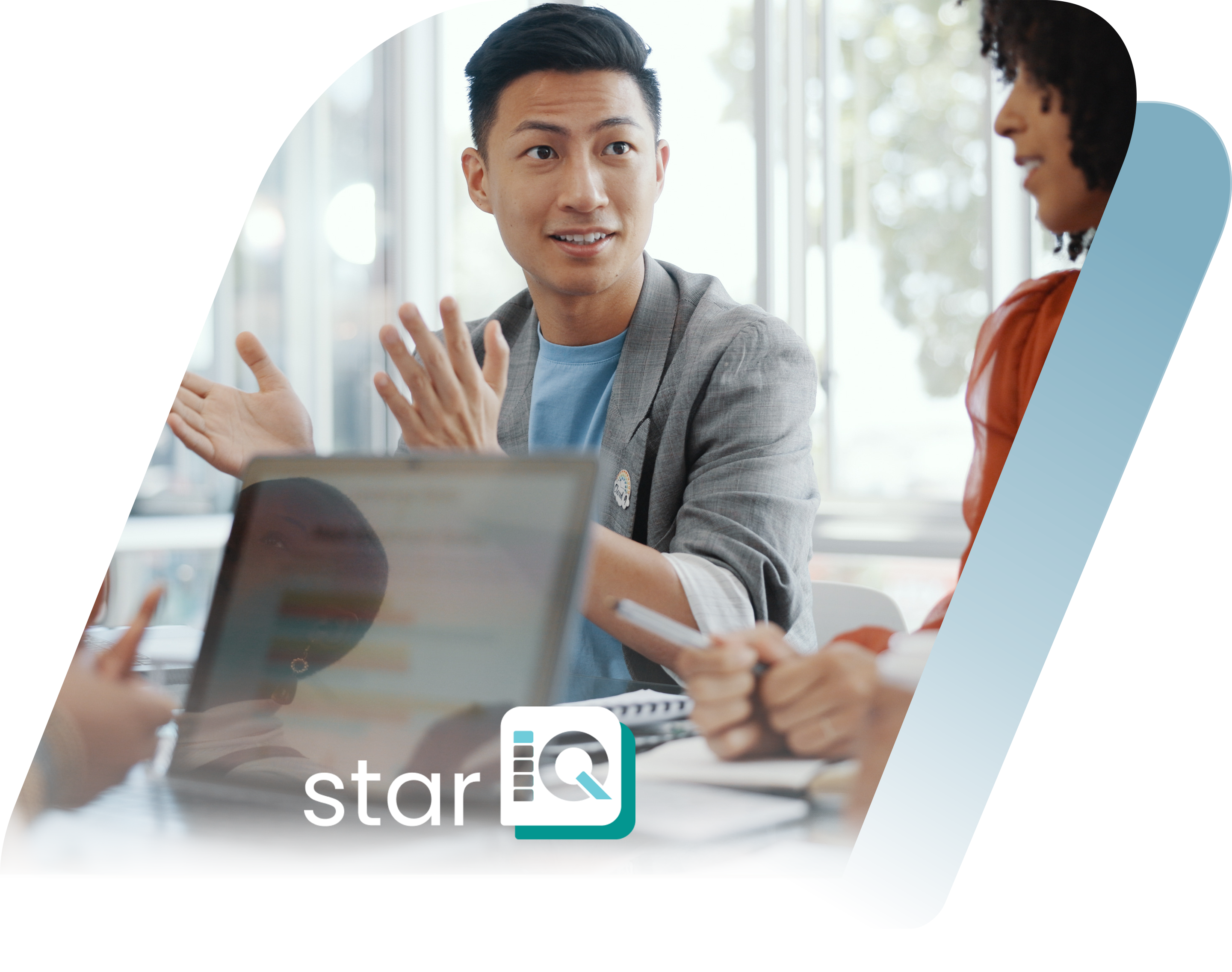 Man explaining on woman with overlay StarIQ logo